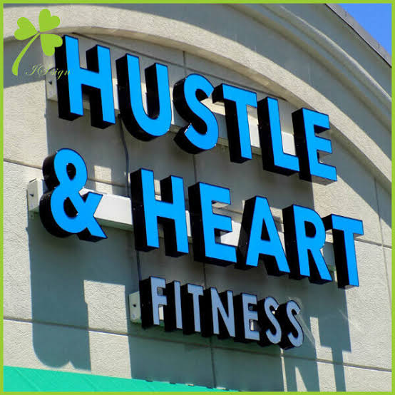 Close-up of a custom LED channel letter sign on a storefront in Orlando