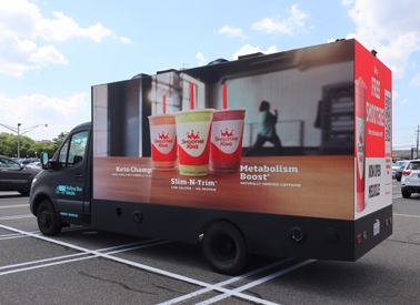 Custom LED advertising truck built by AMMPS parked and ready for delivery