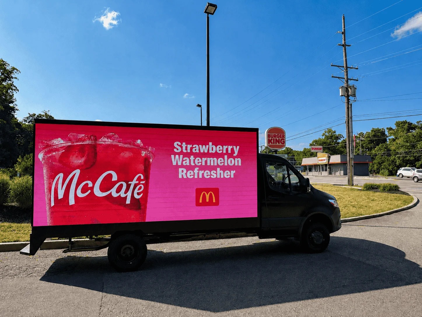 Mobile billboard truck in the Westshore area of Tampa during rush hour